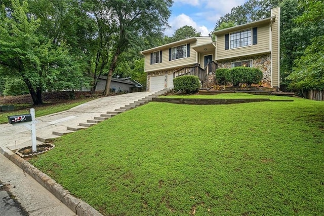 735 Waterbrook Ter, Roswell, GA 30076 - bi-level home featuring a chimney, a garage, stone siding, a front yard, and stairway