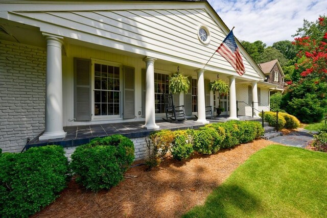 entrance to property with a porch