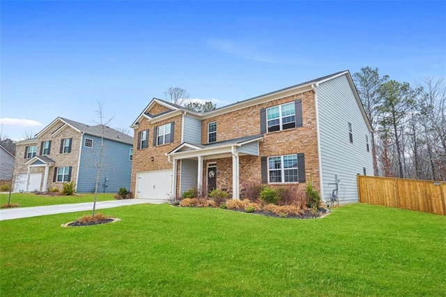 view of front of house with a garage and a front lawn