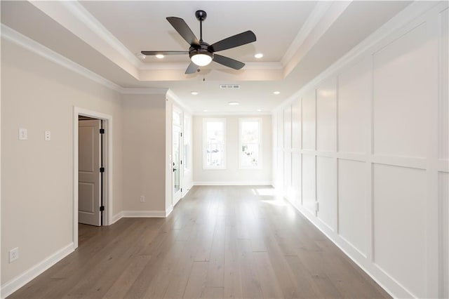 530 Fisher Dr Unit 45, Alpharetta, GA 30009 - empty room featuring a tray ceiling, wood finished floors, a ceiling fan, baseboards, and ornamental molding