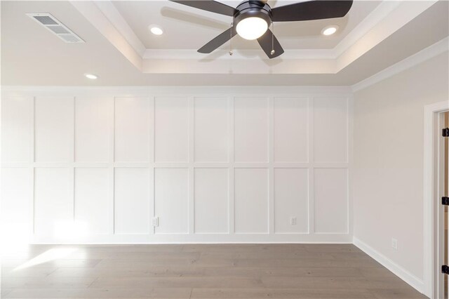 530 Fisher Dr Unit 45, Alpharetta, GA 30009 - empty room with a tray ceiling, crown molding, light wood-style floors, a ceiling fan, and recessed lighting