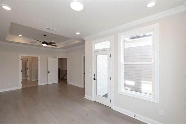 530 Fisher Dr Unit 45, Alpharetta, GA 30009 - unfurnished room featuring crown molding, a tray ceiling, light wood-style floors, baseboards, and a ceiling fan