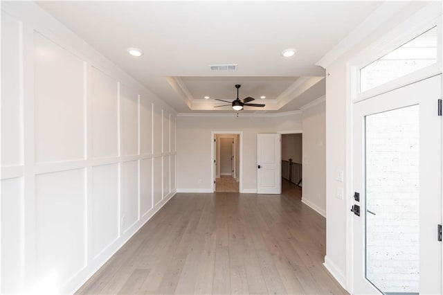 530 Fisher Dr Unit 45, Alpharetta, GA 30009 - hall featuring a raised ceiling, light wood-type flooring, crown molding, recessed lighting, and baseboards