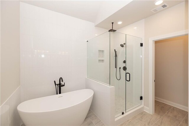 530 Fisher Dr Unit 45, Alpharetta, GA 30009 - bathroom with a stall shower and a soaking tub