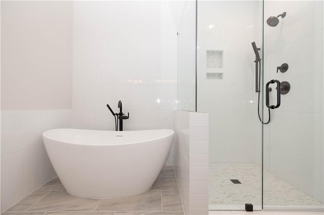 530 Fisher Dr Unit 45, Alpharetta, GA 30009 - full bathroom with tile walls, tiled shower, and a soaking tub