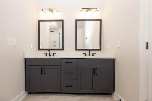 530 Fisher Dr Unit 45, Alpharetta, GA 30009 - bathroom featuring baseboards and double vanity