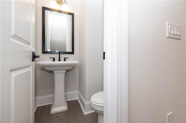 530 Fisher Dr Unit 45, Alpharetta, GA 30009 - bathroom featuring toilet, wood finished floors, baseboards, and a sink