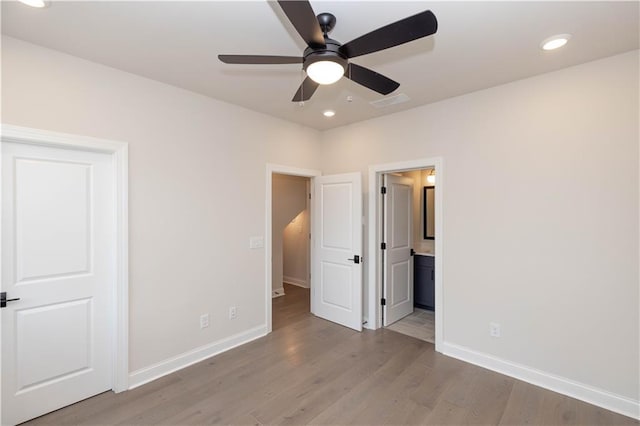530 Fisher Dr Unit 45, Alpharetta, GA 30009 - unfurnished bedroom with light wood-style floors, baseboards, recessed lighting, connected bathroom, and a ceiling fan