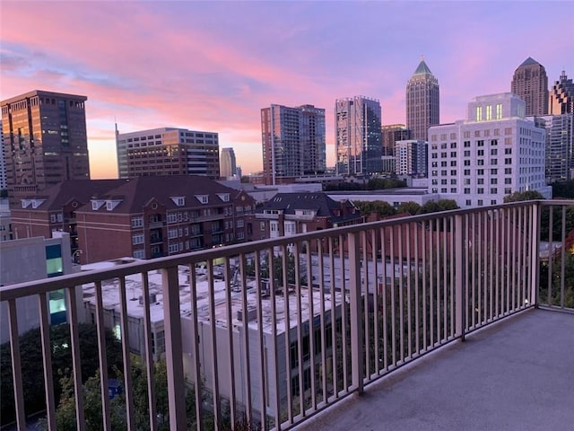 view of balcony at dusk