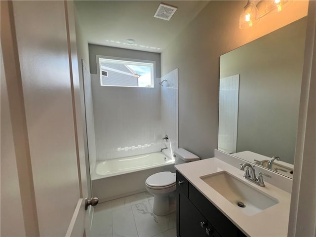 full bathroom featuring vanity, tub / shower combination, and toilet