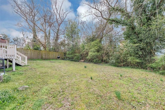 view of yard featuring fence