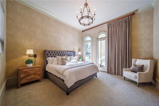 carpeted bedroom featuring a chandelier and ornamental molding