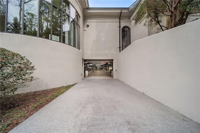 exterior space featuring stucco siding