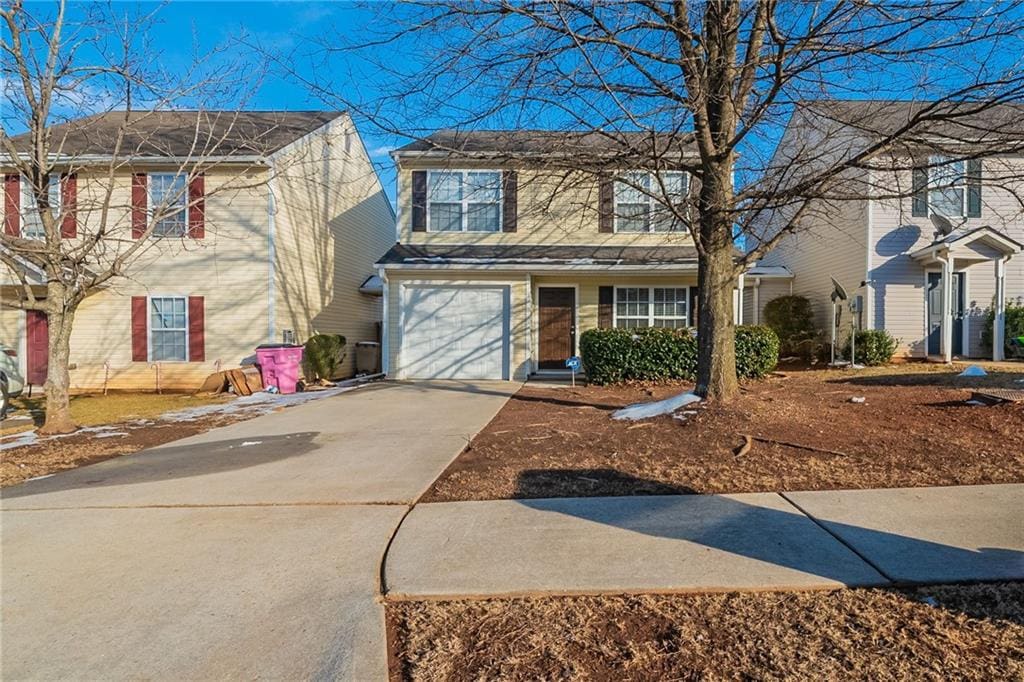 view of front of house with a garage