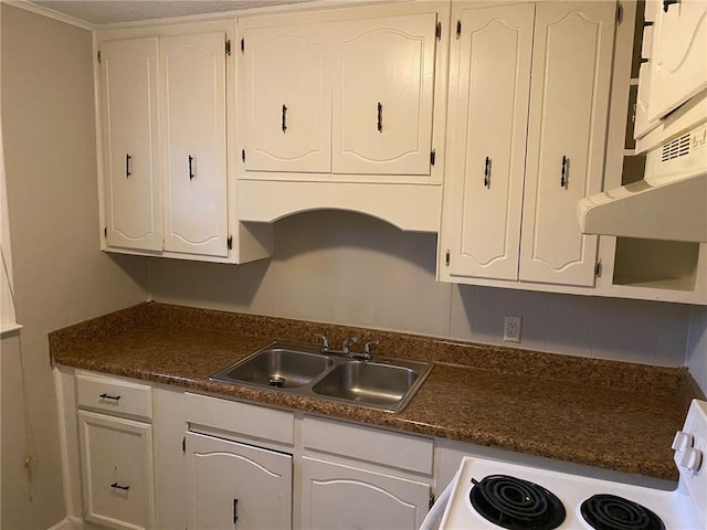 kitchen featuring white cabinets, dark countertops, white electric range, under cabinet range hood, and a sink