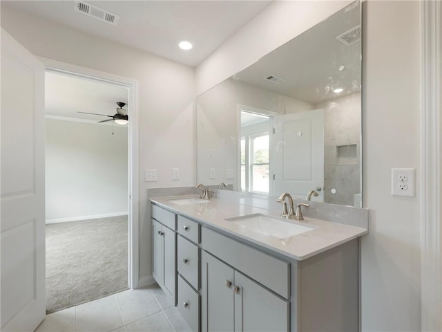 bathroom featuring ceiling fan, tile patterned flooring, and vanity