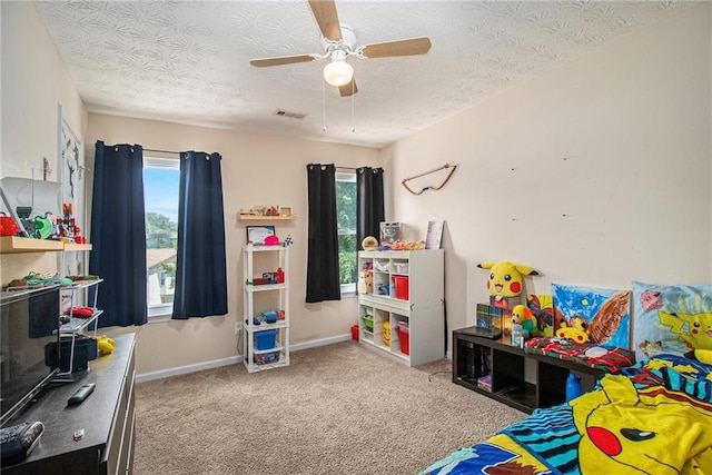 45 Ratliff Dr, Covington, GA 30016 - rec room featuring carpet, ceiling fan, and a textured ceiling