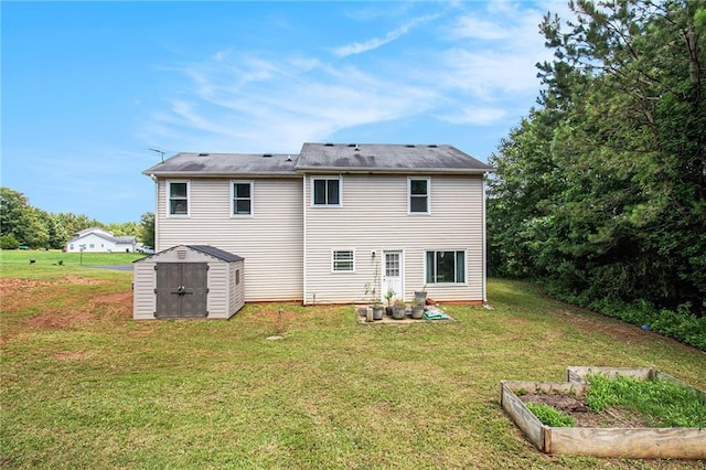 45 Ratliff Dr, Covington, GA 30016 - rear view of house featuring a storage shed, a garden, and a lawn