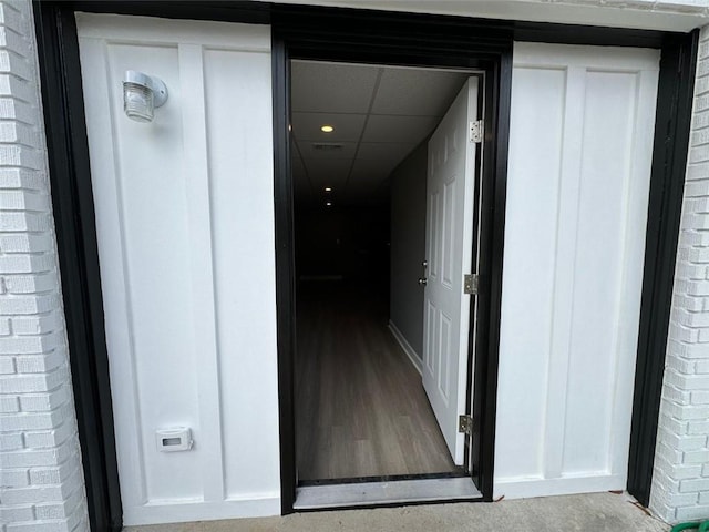 property entrance featuring brick siding