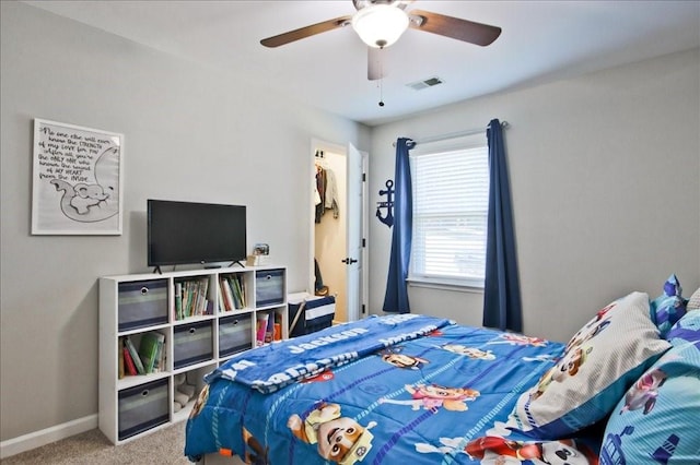 bedroom with ceiling fan, carpet, visible vents, and baseboards