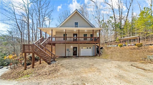 view of front of home featuring a garage and covered porch