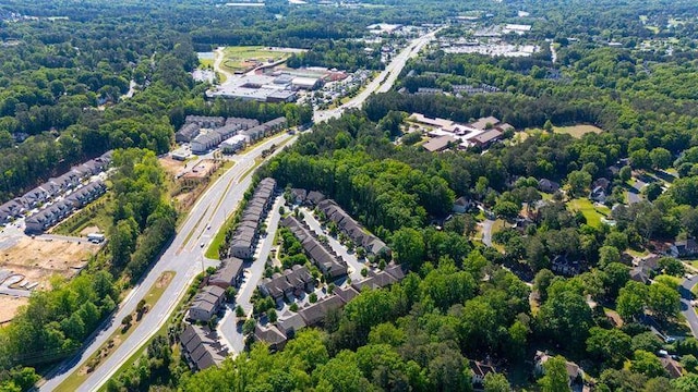 view of property location featuring a heavily wooded area