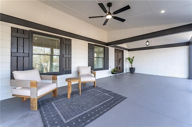 view of patio featuring ceiling fan