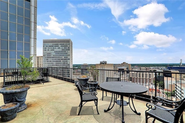 view of patio / terrace with a balcony