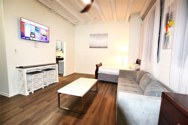 living room with ceiling fan, beam ceiling, and dark wood-type flooring