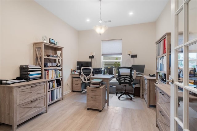 office space featuring light hardwood / wood-style floors