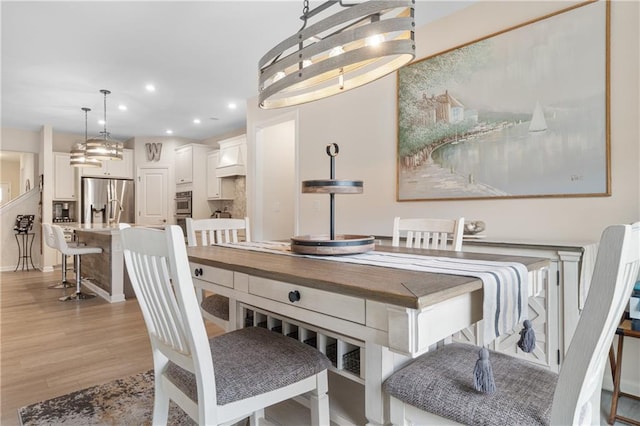 dining area featuring light hardwood / wood-style floors