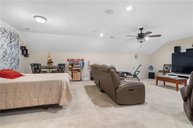 bedroom featuring lofted ceiling, light carpet, and ceiling fan