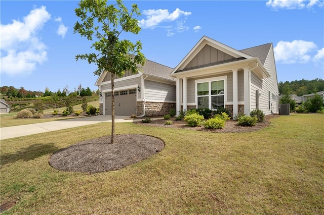 craftsman house featuring a garage, central air condition unit, and a front lawn