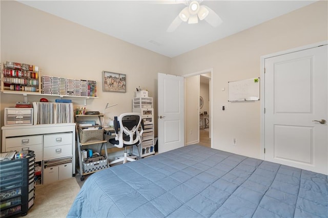 bedroom with ceiling fan and carpet