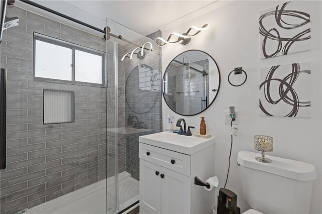 10 26th St NW Unit A2, Atlanta, GA 30309 - full bathroom featuring toilet, ornamental molding, vanity, and a stall shower