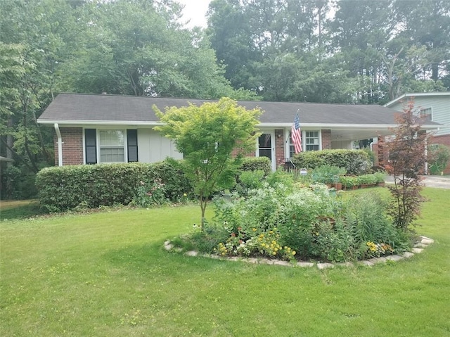 ranch-style house with a front lawn