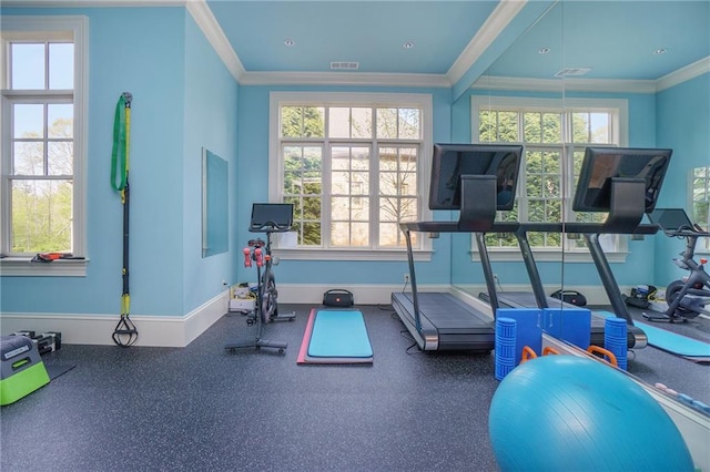 exercise room with ornamental molding