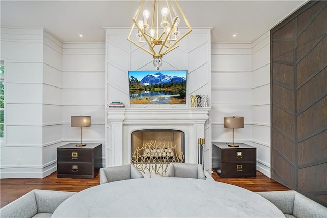 bedroom featuring dark hardwood / wood-style floors and an inviting chandelier