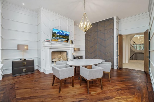 dining room with a chandelier and dark wood-type flooring