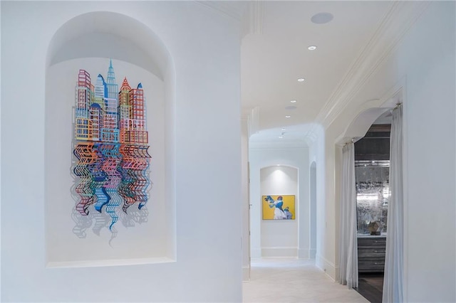 hallway featuring ornamental molding