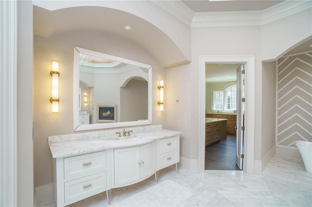 bathroom with ornamental molding, large vanity, and tile flooring