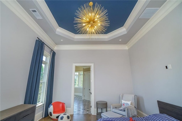 tiled bedroom with a notable chandelier, a raised ceiling, and ornamental molding