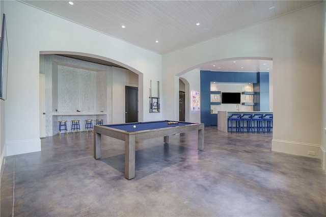 recreation room featuring billiards and indoor bar