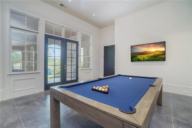 recreation room featuring billiards and french doors