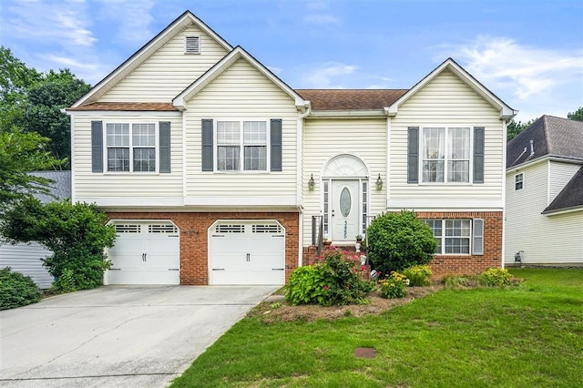 3485 Palisade Lake Dr, Duluth, GA 30096 - bi-level home featuring brick siding, a front lawn, driveway, and a garage