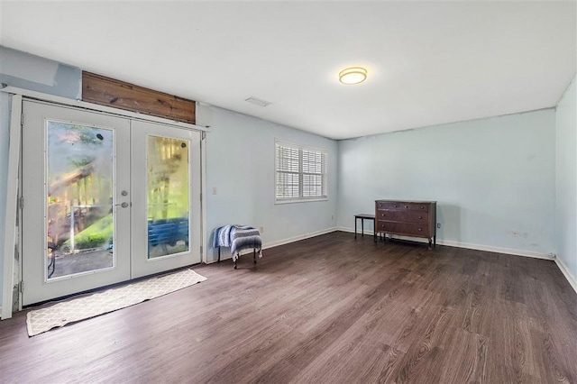 3485 Palisade Lake Dr, Duluth, GA 30096 - living area with french doors, wood finished floors, and baseboards