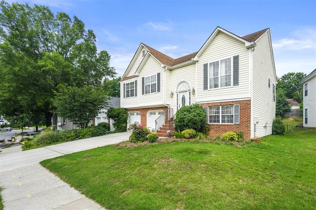 3485 Palisade Lake Dr, Duluth, GA 30096 - bi-level home featuring brick siding, driveway, an attached garage, and a front yard