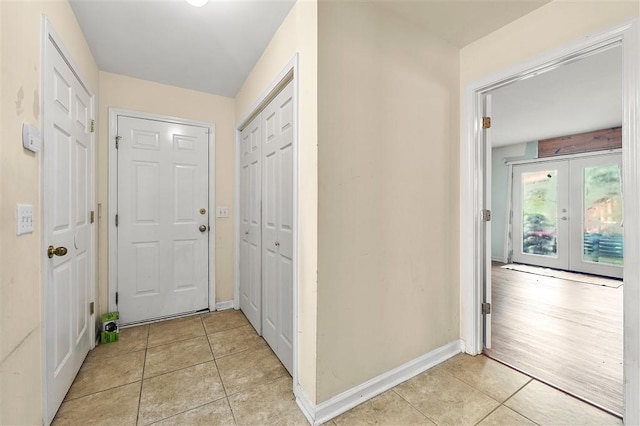 3485 Palisade Lake Dr, Duluth, GA 30096 - entryway with light tile patterned floors, baseboards, and french doors