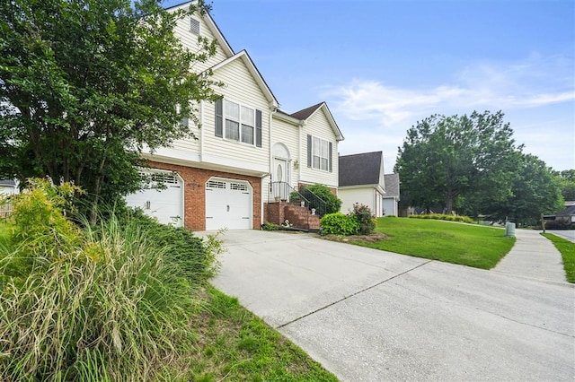 3485 Palisade Lake Dr, Duluth, GA 30096 - split foyer home featuring a garage, brick siding, a front yard, and driveway
