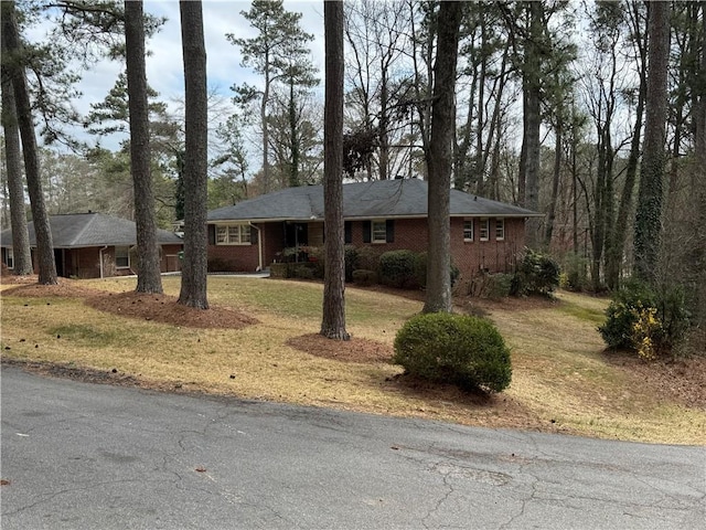1376 Woodbine St, Marietta, GA 30062 - ranch-style house featuring brick siding and a front yard